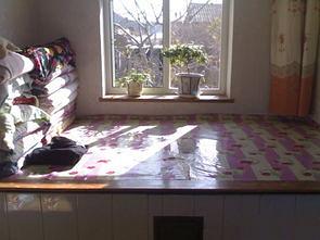 梦到火炕里冒火，梦到火炕塌了个坑